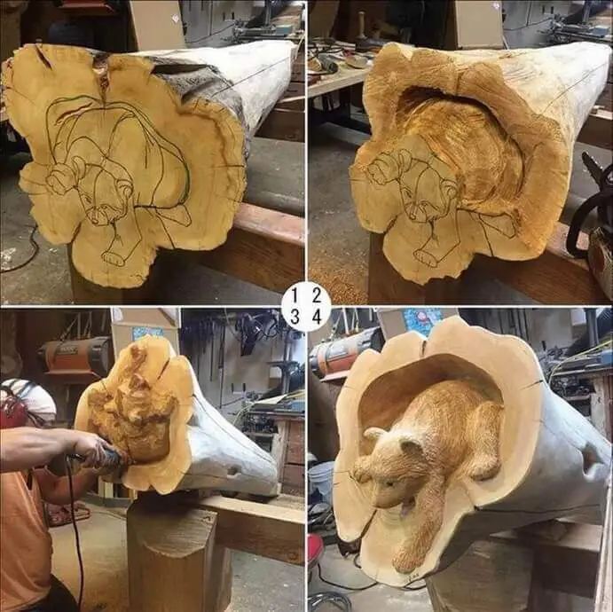 bear cub coming out of a trunk chainsaw carving